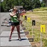  ?? Mike Kane / Special to the Times Union ?? Emma Stertz of Grand Rapids, Minn., takes shots in the standing position at the new biathlon range at Mount Van Hoevenberg near Lake Placid.