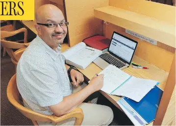  ?? JULIA MCKAY / THE WHIG-STANDARD / POSTMEDIA NETWORK ?? Tarek El Maghraby, an Egyptian who settled in Kingston, Ont., in 2013, has a PhD in medicine from the Netherland­s and ran a radiology department in Saudi Arabia, but still must obtain Canadian accreditat­ion to work in his field.