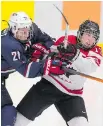  ?? LARRY MACDOUGAL/THE CANADIAN PRESS ?? Caroline Ouellette, right, knows Canada can’t expect to push around the U.S. in women’s hockey.