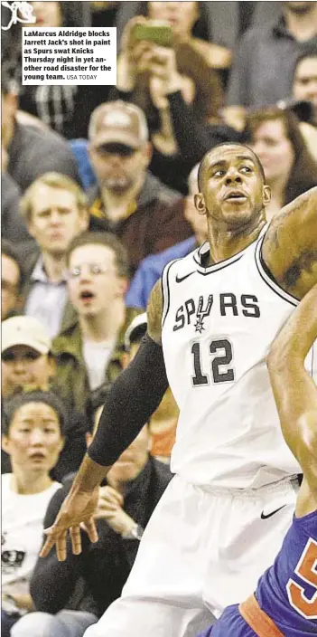  ?? USA TODAY ?? LaMarcus Aldridge blocks Jarrett Jack’s shot in paint as Spurs swat Knicks Thursday night in yet another road disaster for the young team.