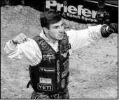  ??  ?? Jess Lockwood, 22, celebrates after a winning ride at the PBR World Finals on Friday at T-Mobile Arena. The former world champion is second in this year’s standings despite having suffered a broken collarbone in February.