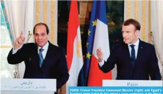  ?? —AFP ?? PARIS: French President Emmanuel Macron (right) and Egypt’s President Abdel Fattah El-Sisi attend a press conference at the Elysee Palace in Paris yesterday.