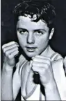  ??  ?? A young Darius at a Holy Family boxing night held in the O Raghallaig­hs.