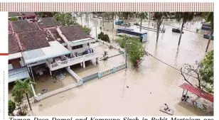  ?? PIC BY AMIR IRSYAD OMAR ?? Taman Desa Damai and Kampung Sireh in Bukit Mertajam are inundated yesterday.