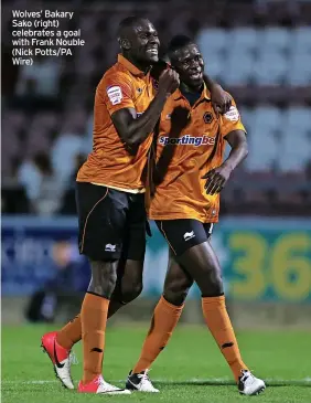  ?? (Nick Potts/pa Wire) ?? Wolves’ Bakary Sako (right) celebrates a goal with Frank Nouble