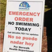  ?? Ned Gerard/Hearst Connecticu­t Media ?? A local was closed to swimmers due to high bacteria counts following heavy rains last year.