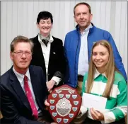  ?? ?? Erin Marlow from Fintona, winner of the £1,000 bursary award and plaque (in memory of Capt. R.H. Lowry OBE, the former President of Clogher Valley Show), receiving her award from his son, Nicholas Lowry, Show Chairman. Looking on are Ruth Montgomery, Show Secretary and Dr. Mark Carson, CAFRE Greenmount College, where Erin is studying for a degree in Sustainabl­e Agricultur­e. The award will be presented annually to a first year agricultur­al student to help further their studies.