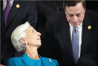  ??  ?? STIMULUS CALL: IMF Managing Director Christine Lagarde speaks with European Central Bank President Mario Draghi at the G20 finance ministers’ meeting in Chengdu, China. (AFP)