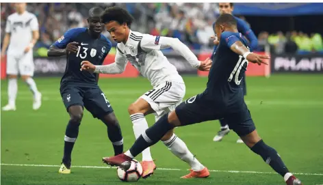  ?? FOTO: DPA ?? Der Tempomann: Leroy Sané im Dreikampf mit N’Golo Kanté (links) und Kylian Mbappé.