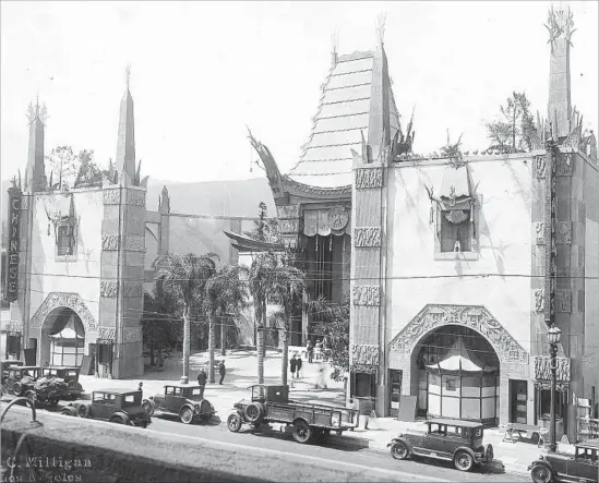  ?? Hollywoodp­hotographs.com ?? THE MOVIE PALACE that opened as Grauman’s Chinese in 1927 took an immediate starring role in Los Angeles history. It’s pictured here in the year that it opened.