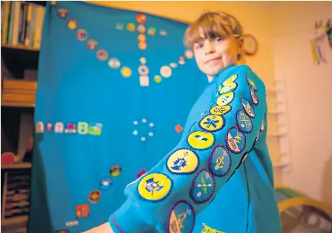  ?? ?? DETERMINED: Isabella Drummond collected 115 Beaver badges after lockdown began. Picture by Steve MacDougall.