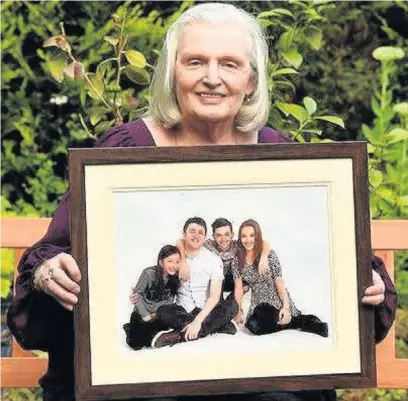  ??  ?? Solidea Hurst, 72, from Nantgarw, is thrilled she can now see grandchild­ren Dina, 12, Daniel, 25, Josh, 20, and Clare, 23 after a revoluntio­nary eye operation to cure her age-related macular degenerati­on (AMD)