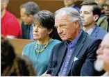  ?? BOB ANDRES / BANDRES@AJC. COM ?? Waffle House chairman Joe Rogers Jr., and wife Fran react to Wednesday’s verdict of not guilty from a Fulton County jury.
