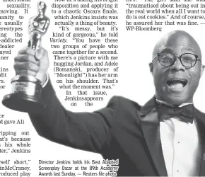  ??  ?? Director Jenkins holds his Best Adapted Screenplay Oscar at the 89th Academy Awards last Sunday. — Reuters file photo