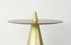  ??  ?? Top — A collaborat­ion between Son and furniture designer Tom Fereday, this brass dining table with timber top incorporat­es a vase in its centre. Photograph­y: Fiona Susanto.