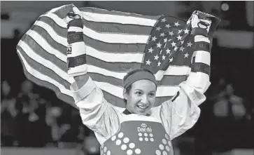  ?? Harry How Getty Images ?? JACKIE GALLOWAY is representi­ng the United States in taekwondo in the Rio de Janeiro Olympics after competing for Mexico because of dual citizenshi­p through her mother.