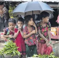  ?? PHOTO: REUTERS ?? Under the weather . . . Monsoon rains hit the Unchiprang refugee camp in Cox’s Bazar, Bangladesh, last month.