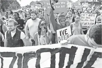  ?? JEREMIAH WILSON, USA TODAY NETWORK ?? Protesters prepare for a speech by white nationalis­t Richard Spencer at the University of Florida.