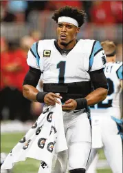  ?? BOB ANDRES / BANDRES@AJC.COM ?? Carolina quarterbac­k Cam Newton’s future is uncertain because of injuries and the Panthers have lost five straight — and their coach.