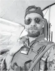  ?? ?? Eddy Etue, 36, a U.S. Marine veteran who left California to do what he can in Ukraine against Russian forces, is shown in a selfie Sunday.