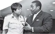  ?? CONTRIBUTE­D ?? National Security Minister Robert Montague has a tête-àtête with acting Commission­er of Police Novelette Grant at the Jamaica Conference Centre, downtown Kingston, on January 17. While Montague has made plain his preference for the top cop to emerge...
