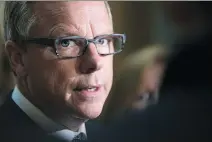  ?? MICHAEL BELL ?? Premier Brad Wall will invoke the notwithsta­nding clause to allow continued funding for non-Catholic students in Catholic schools.