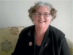  ?? SUPPLIED ?? Orewa resident Julie Denham wearing mother Heather Denham’s brooch, left lapel, and grandmothe­r Mary Denham’s brooch, right lapel.