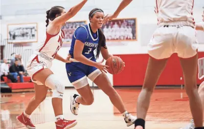  ?? NATHAN PAPES/SPRINGFIEL­D NEWS-LEADER FILE ?? After averaging 15 points, 5.1 rebounds and 2.3 assists per game and leading Marshfield to a third-place finish in the Class 5 state playoffs, Lauren Luebbert was named the News-Leader’s 2023-24 girls high school basketball Player of the Year.