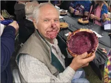  ?? PHOTO PROIVIDED ?? Halfmoon Senior Paul Markowski holds his empty pie plate after being declared winner of the Saratoga County Year of the Senior Fall Harvest Festival pie eating contest.