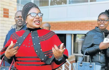 ?? Picture: SIBONGILE NGALWA ?? ACCUSED: Widow Bulelwa Ndudula, who stands accused of murdering her husband in 2016, leaves the High Court in Vincent yesterday.