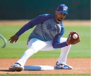  ?? ASHLEY LANDIS/AP ?? The Dodgers’ Mookie Betts is shifting from right field, where he won six Gold Glove awards, to second base.