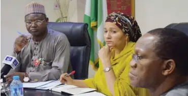  ?? Photo: Esther Agbarakwe ?? Minister of Environmen­t Amina Mohammed (centre) and her co minister Ibrahim Usman Jibril (left) with the Director General of Debt Management Office, Dr. Abraham Nwankwo during the public private advisory meeting in Abuja recently