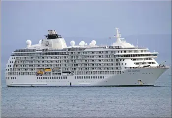  ?? Photo: Duncan MacNeill. ?? The World cruise ship as it neared Port Ellen.