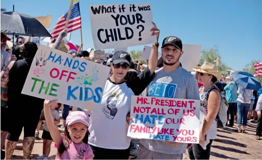  ?? Reuters ?? People protest against a US immigratio­n policy of separating kids from their families when they enter the US as undocument­ed immigrants in Tornillo, Texas. —