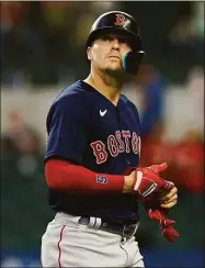  ?? LM Otero / Associated Press ?? The Red Sox’s Enrique Hernandez walks to the dugout after flying out to center field for the final out against the Rangers Sunday in Arlington, Texas.