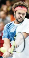  ??  ?? VIENNA: France’s Jo-Wilfried Tsonga returns the ball to Croatia’s Ivo Karlovic during their semifinal match at the ATP tennis tournament in Vienna, Austria, yesterday. — AFP