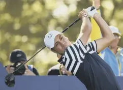  ??  ?? 0 Justin Thomas, one of three US rookies, hits a tee shot in practice