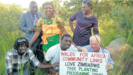  ??  ?? > Love Zimbabwe – Planting trees gets under way in Chinamhora, Zimbabwe