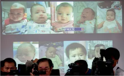  ??  ?? Surrogate babies that the Thai police suspect were fathered by the Japanese businessma­n. —