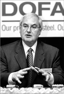  ?? GARY YOKOYAMA/TORSTAR NEWS SERVICE FILE PHOTO ?? Dofasco’s chief executive, shown at a news conference earlier this year, sees “positive indication­s” on prices for his steel.