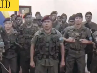  ?? HO / AFP / GETTY IMAGES ?? This image, taken from a video posted on social media Sunday, shows a man who allegedly presented himself as army captain Juan Caguaripan­o declaring a rebellion at an army base in the city of Valencia in Venezuela.