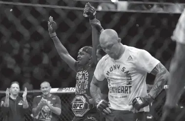  ??  ?? JON Jones celebrates after his win against Anthony Smith in a light heavyweigh­t mixed martial arts title bout at UFC 235, Saturday, March 2, 2019, in Las Vegas.