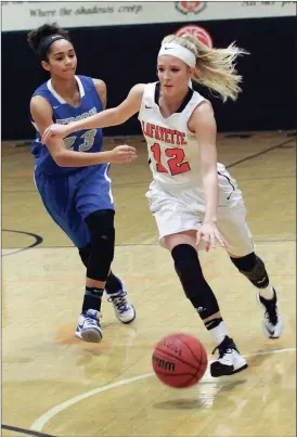  ??  ?? LaFayette’s Madison Harris drives past Trion’s Shayla Youngblood during Senior Night this past Thursday. (Messenger photo/Scott Herpst)