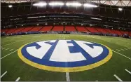  ?? John Bazemore / Associated Press ?? An SEC logo is displayed on the field ahead of a game in Atlanta.