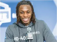  ?? MICHAEL HICKEY/GETTY IMAGES ?? Xavier Worthy of the Texas Longhorns speaks to the media during the 2024 NFL Draft Combine at Lucas Oil Stadium on Friday in Indianapol­is.