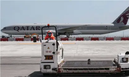  ?? Photograph: Karim Jaafar/AFP/Getty Images ?? A Qatar Airways jet at Hamad Internatio­nal airport in Doha, where nine Australian women were taken off a flight and strip-searched as authoritie­s searched for the mother of a newborn baby found in an airport bathroom.