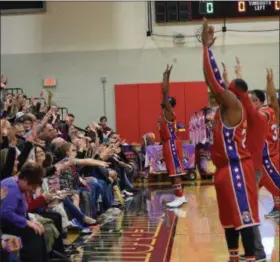  ?? MARIAN DENNIS — MEDIANEWS GROUP ?? The Harlem Wizards got the crowd pumped up during a fundraiser for the Foundation for Boyertown Education.