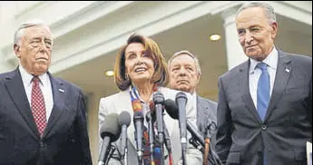  ?? REUTERS ?? House Democratic leader Nancy Pelosi (centre) speaks to reporters on Wednesday.