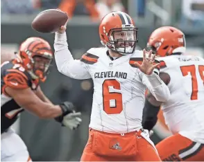 ??  ?? Browns quarterbac­k Baker Mayfield passes against the Bengals on Nov. 25. Mayfield has seven touchdown passes in the last two games.