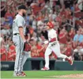  ?? AP ?? Diamondbac­ks starting pitcher Caleb Smith waits as the Cardinals' Nolan Arenado circles the bases after hitting a two-run home run during the fifth inning Tuesday night in St. Louis.